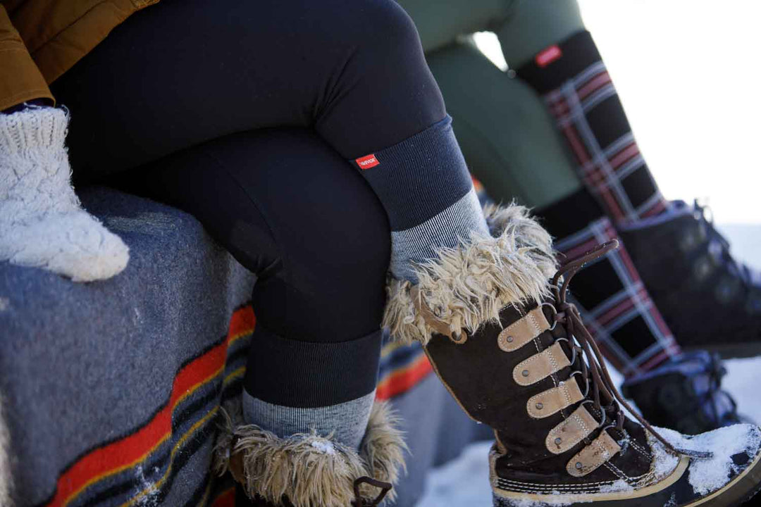 two women on boots wearing compression socks