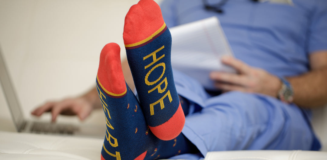 Nurse in knee high VIM & VIGR Compression Socks