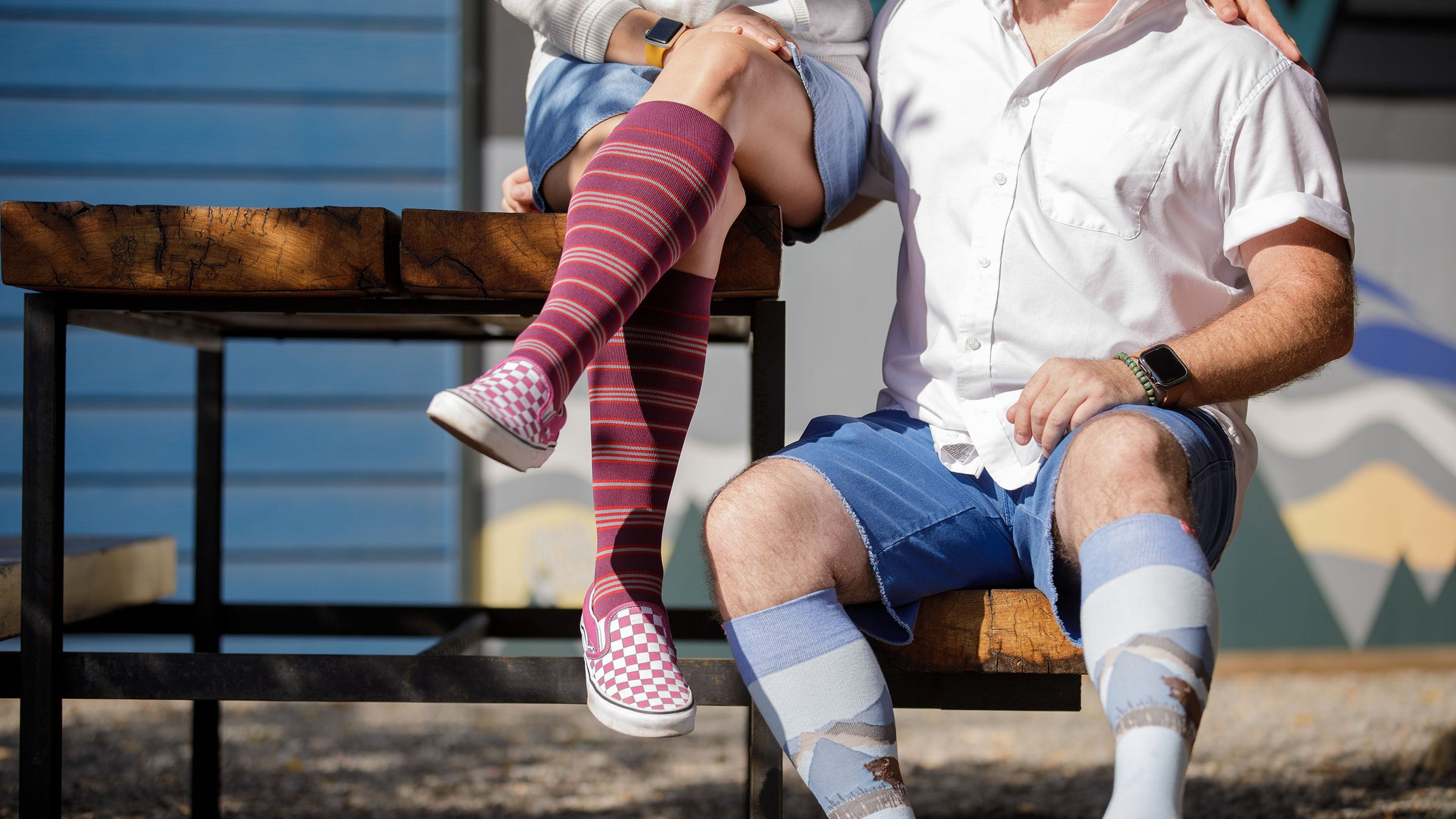 man and woman wearing compression socks on date