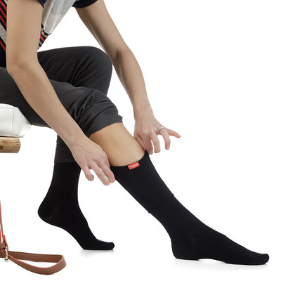 Woman wearing 15-20 mmHg: Solid Black (Moisture-wick Nylon) Compression Socks